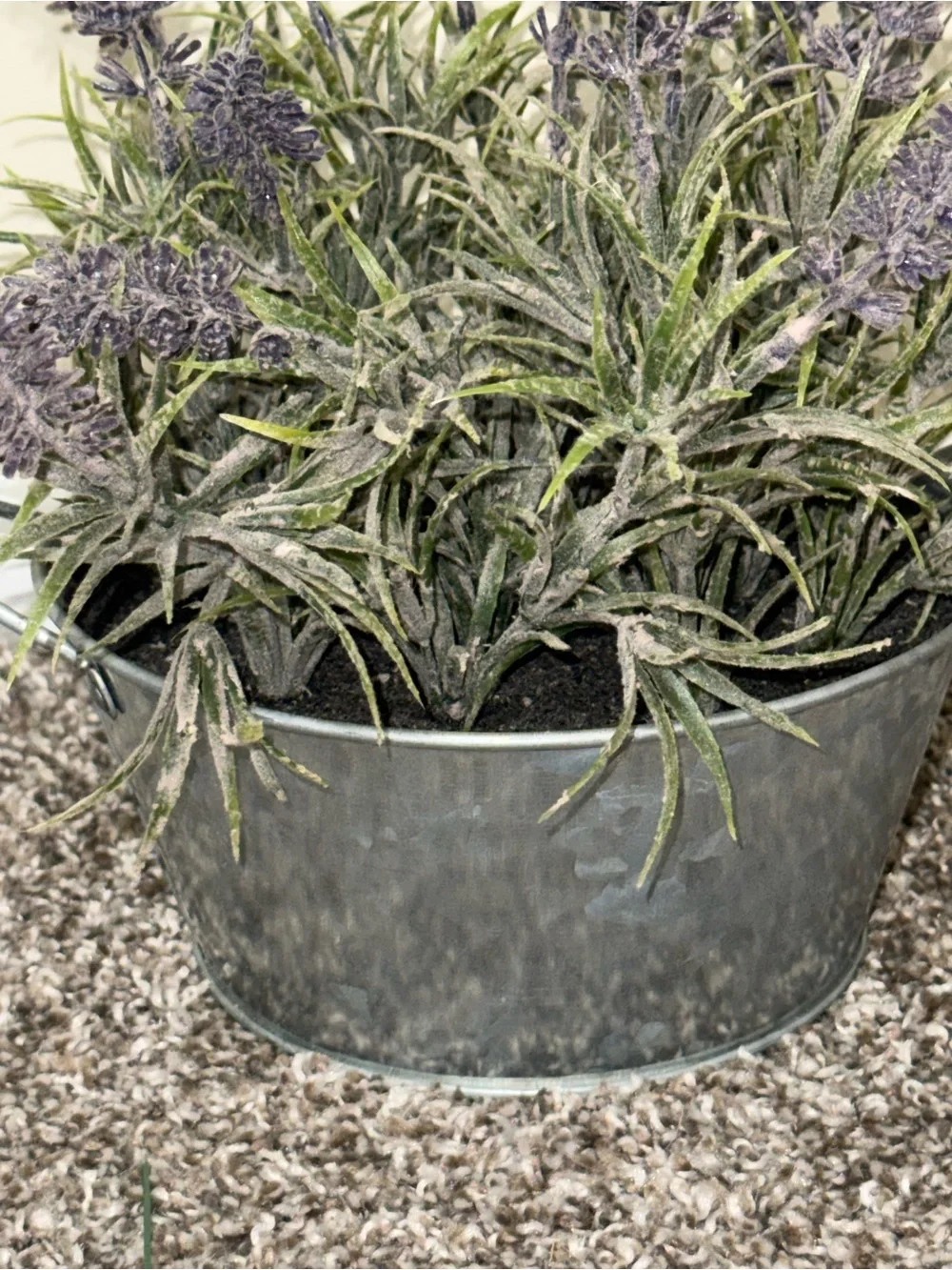 Artificial lavender plant in silver bucket